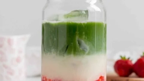 Refreshing Strawberry Matcha Latte served in a glass with vibrant colors