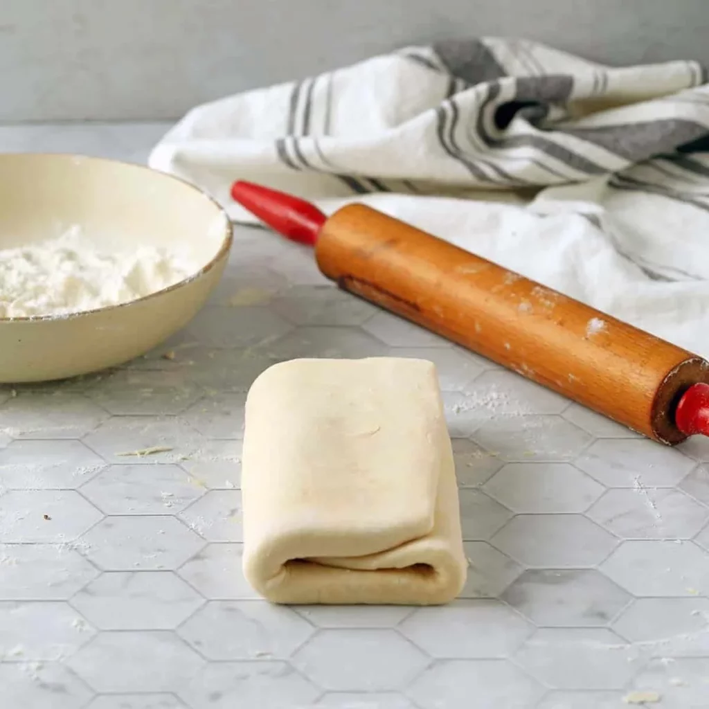 Delicious vegan puff pastry ready for baking in assorted shapes and textures.