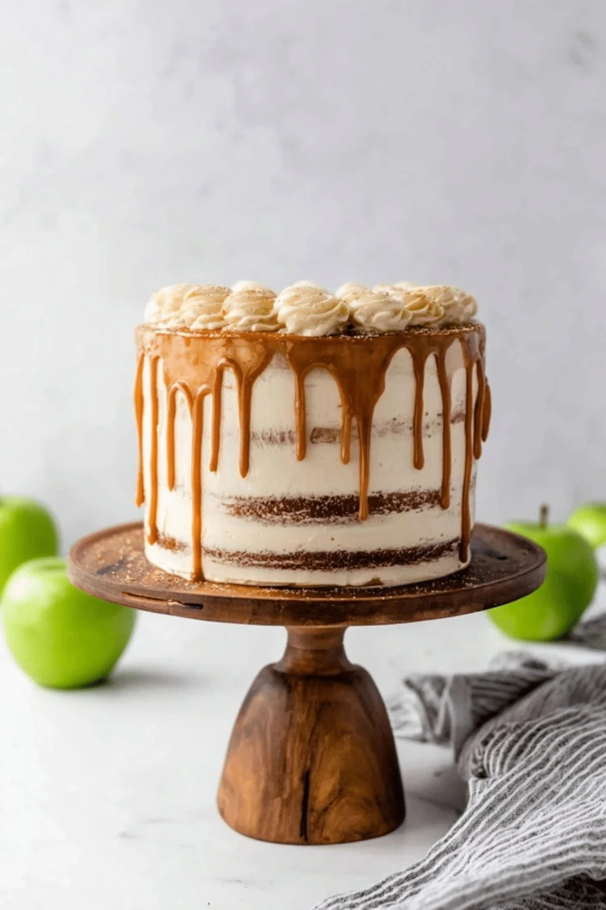 Delicious apple pie layer cake with fresh apples and creamy frosting