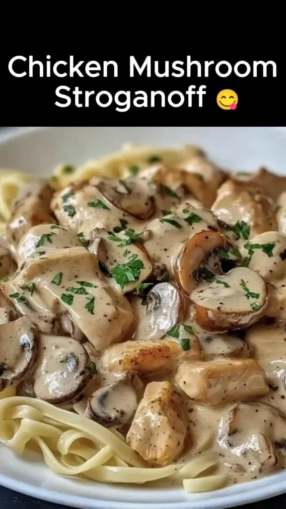 Creamy Chicken Mushroom Stroganoff served in a bowl with herbs on top