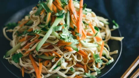 Delicious Chinese Sliced Tofu Salad with fresh vegetables and dressing