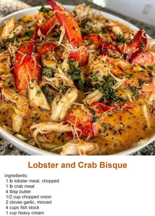 Servings of rich Lobster Crab Bisque in a bowl, garnished with fresh herbs