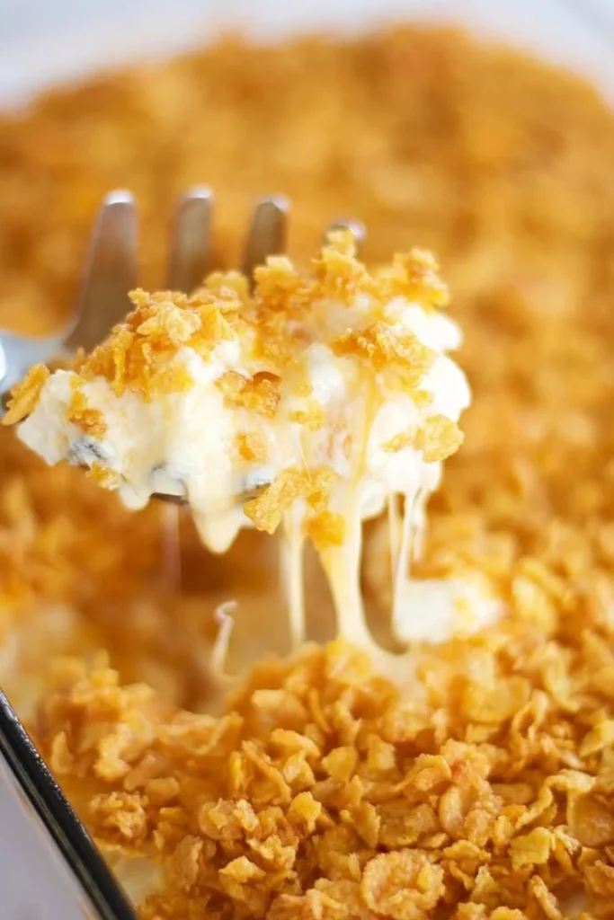 Delicious cheesy potatoes baked to perfection, garnished and ready to serve.