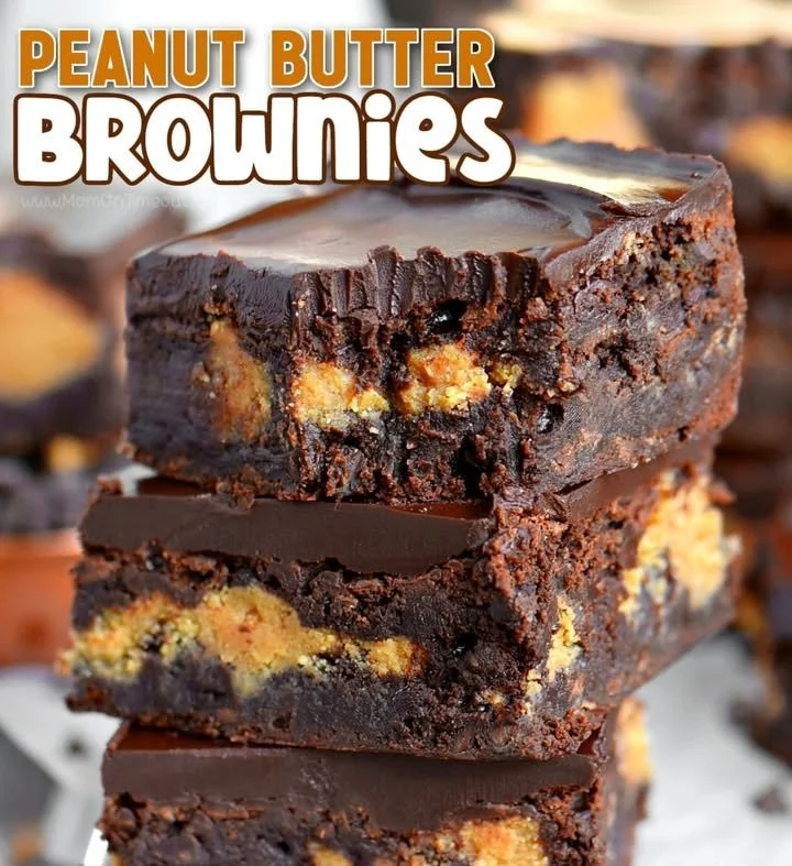 Delicious peanut butter brownies topped with chocolate drizzle on a plate