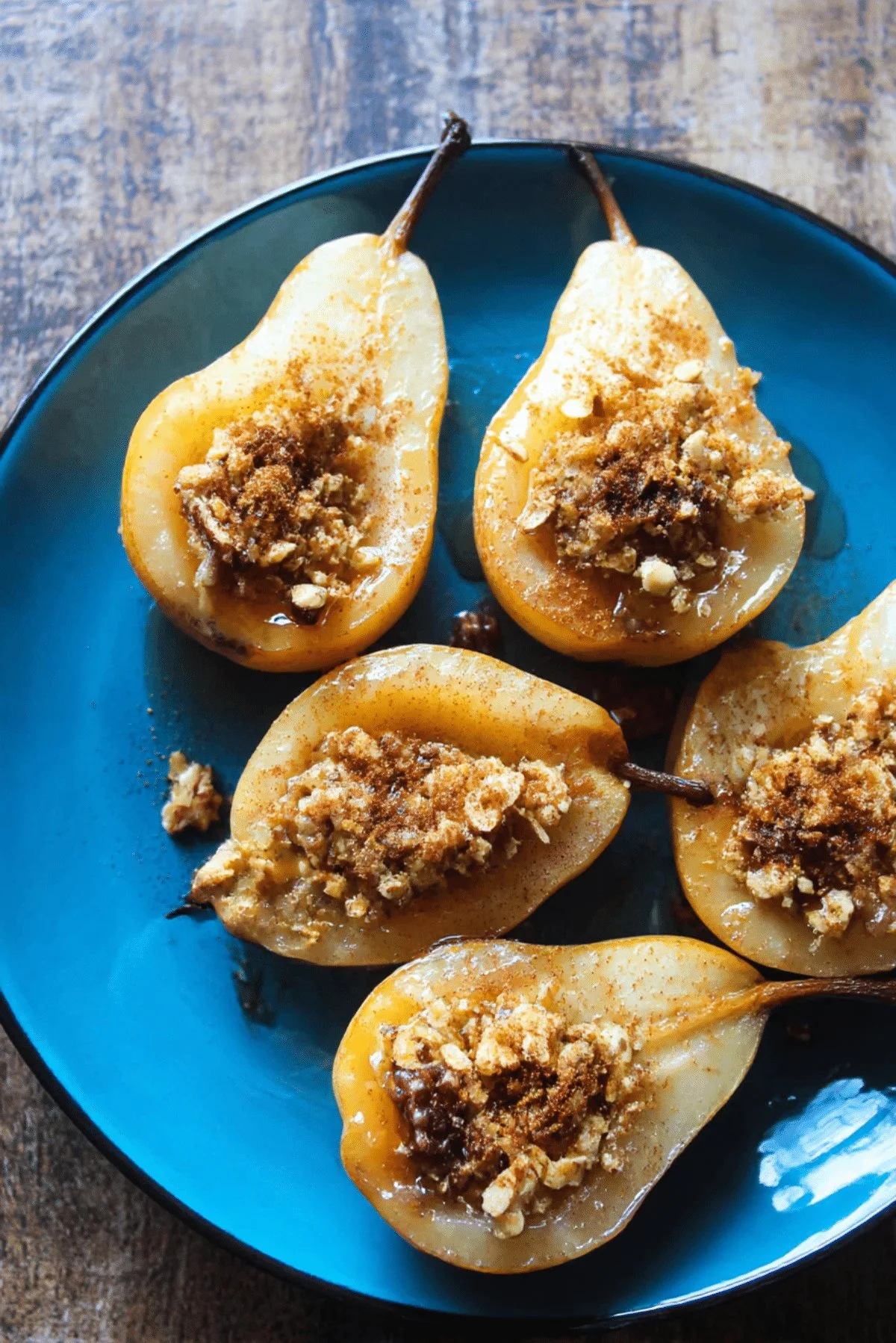 Deliciously baked pears, caramelized and garnished with spices, ready to serve.