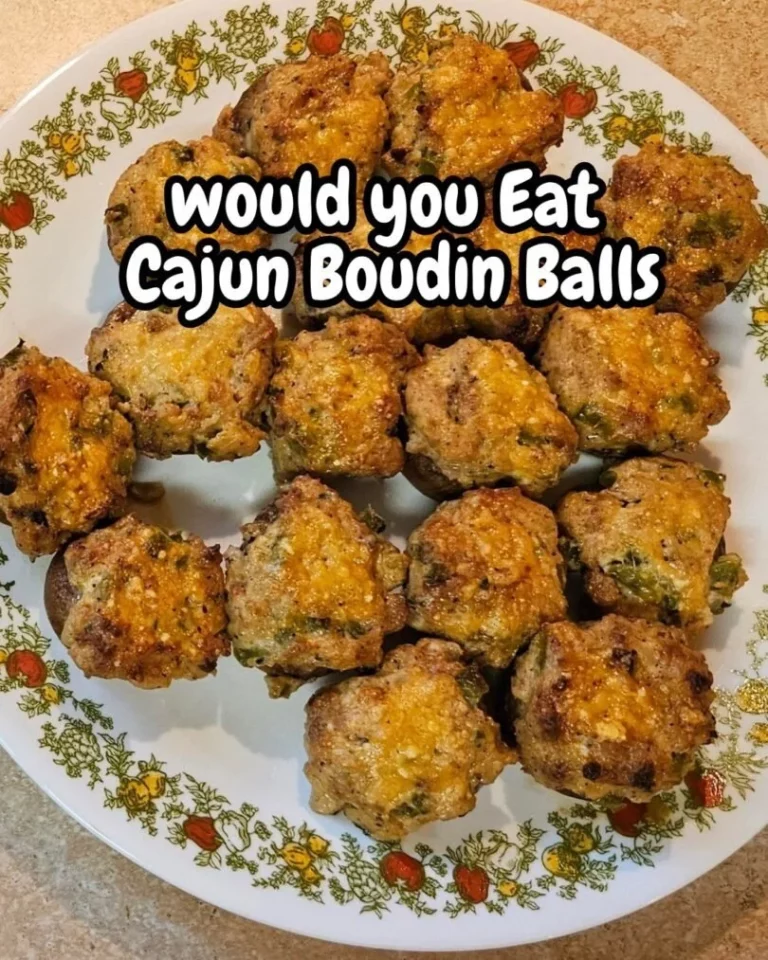 Crispy Boudin Balls served with dipping sauce on a wooden platter
