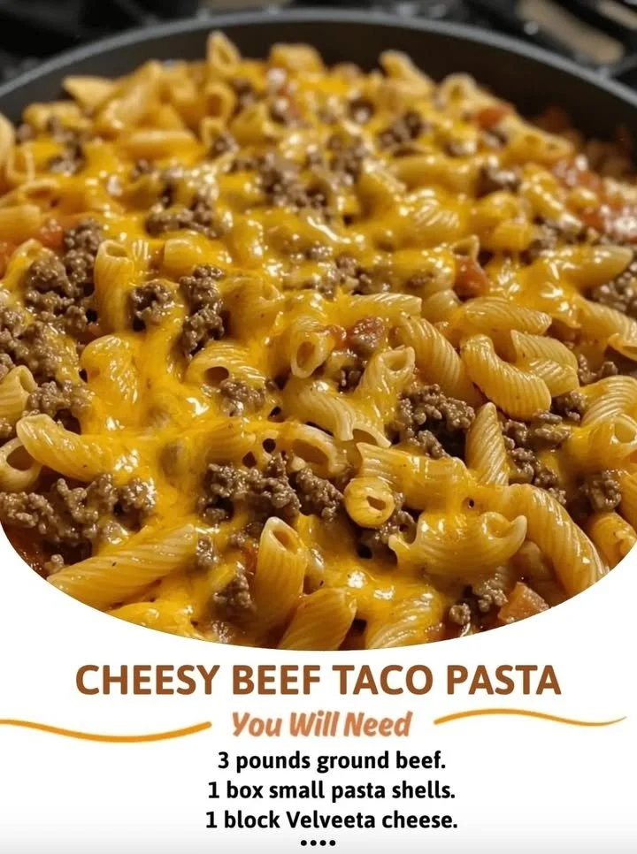 Cheesy beef taco pasta served in a bowl garnished with fresh cilantro