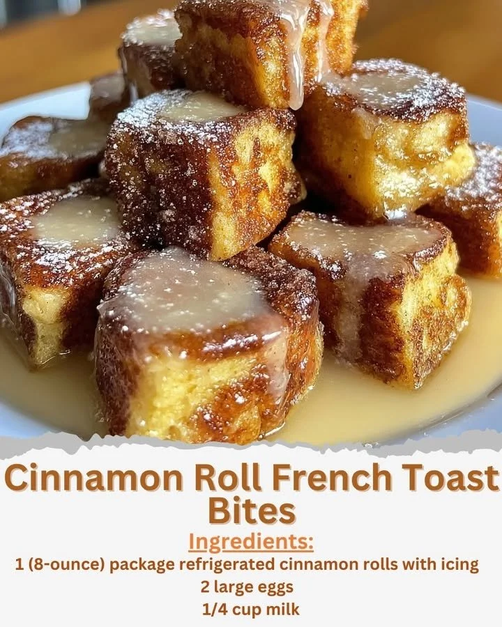 Cinnamon Roll French Toast Bites on a plate topped with syrup and powdered sugar