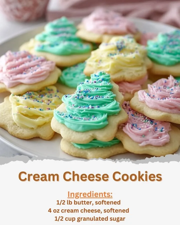 Tray of freshly baked cream cheese cookies with a soft and creamy texture.