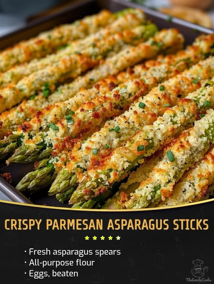 Crispy Parmesan asparagus sticks served on a plate garnished with herbs.