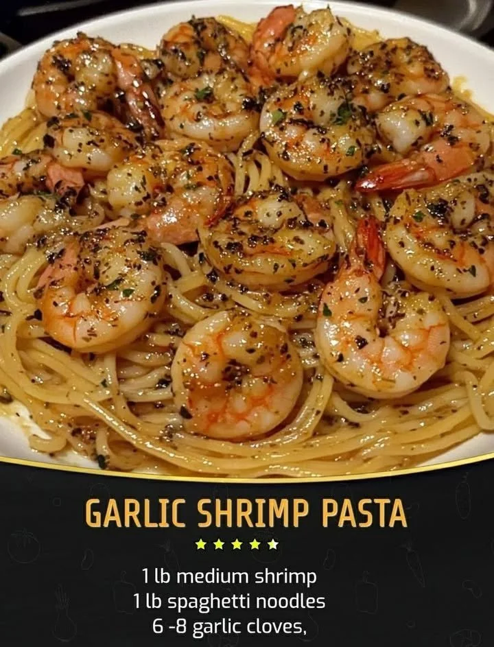Delicious plate of Garlic Shrimp Pasta garnished with herbs