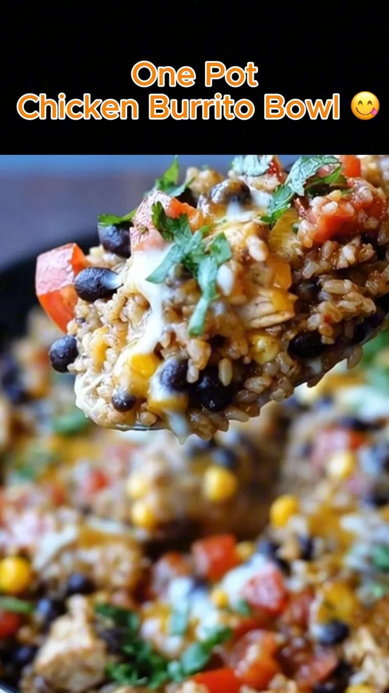 One Pot Chicken Burrito Bowl with rice, chicken, beans, and fresh toppings