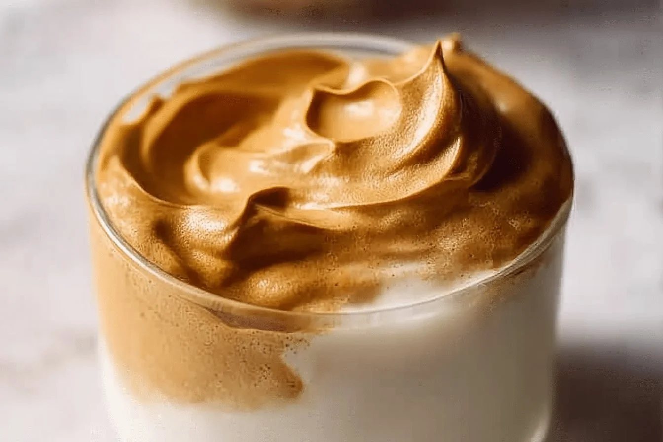 Delicious Pumpkin Whipped Coffee in a cozy mug, perfect for autumn mornings