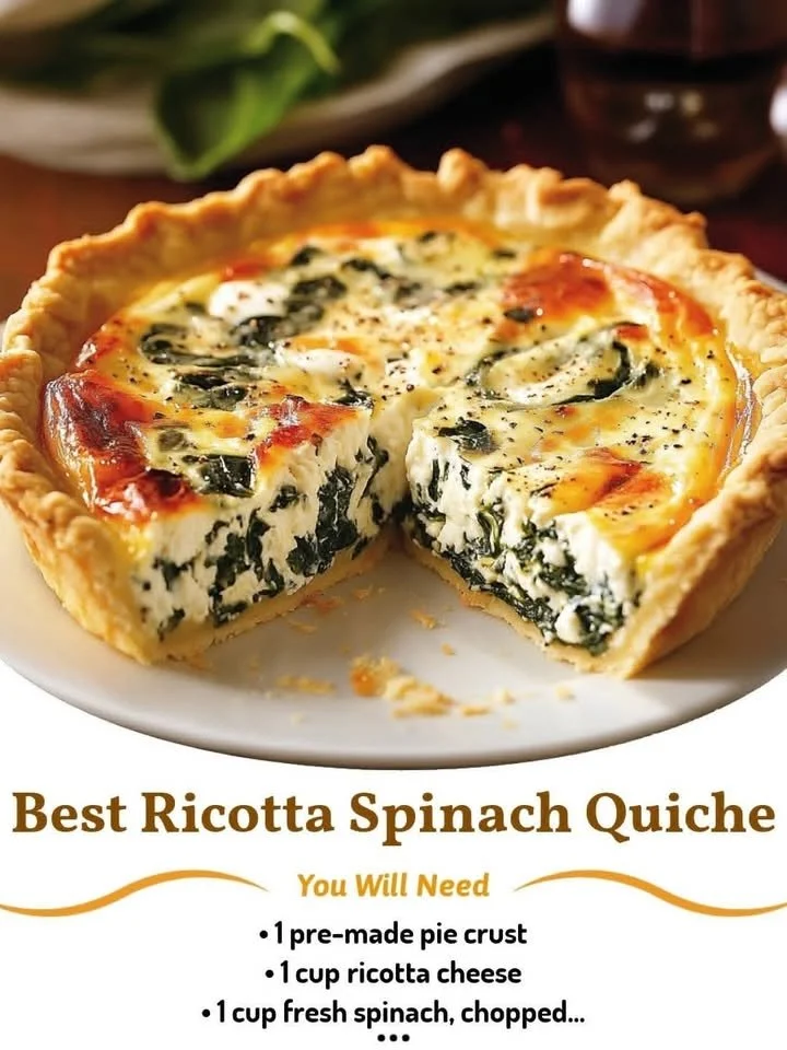 Slice of ricotta spinach quiche served on a plate with a side salad.