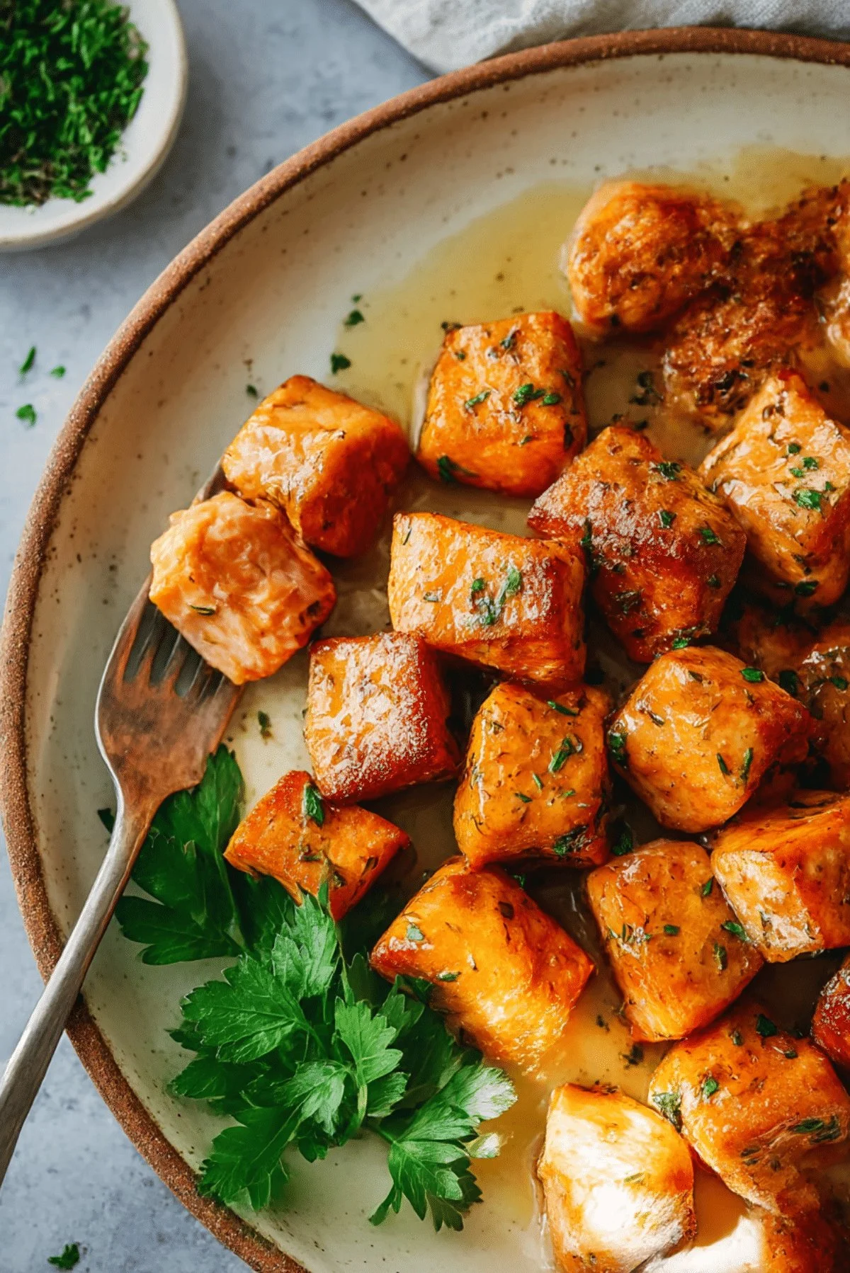 Healthy salmon bites cooked to perfection, served as a tasty appetizer.