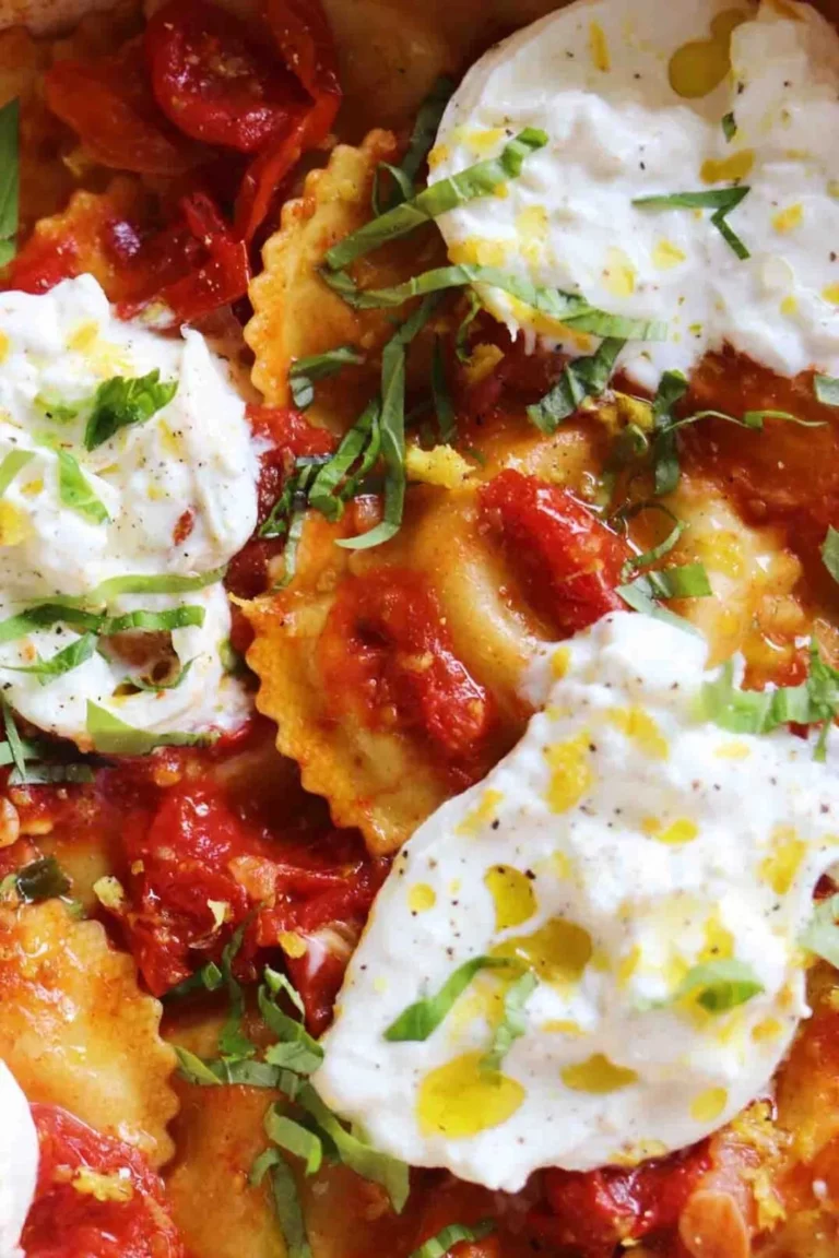 Trader Joe's ricotta lemon zest ravioli with burst tomatoes and burrata cheese
