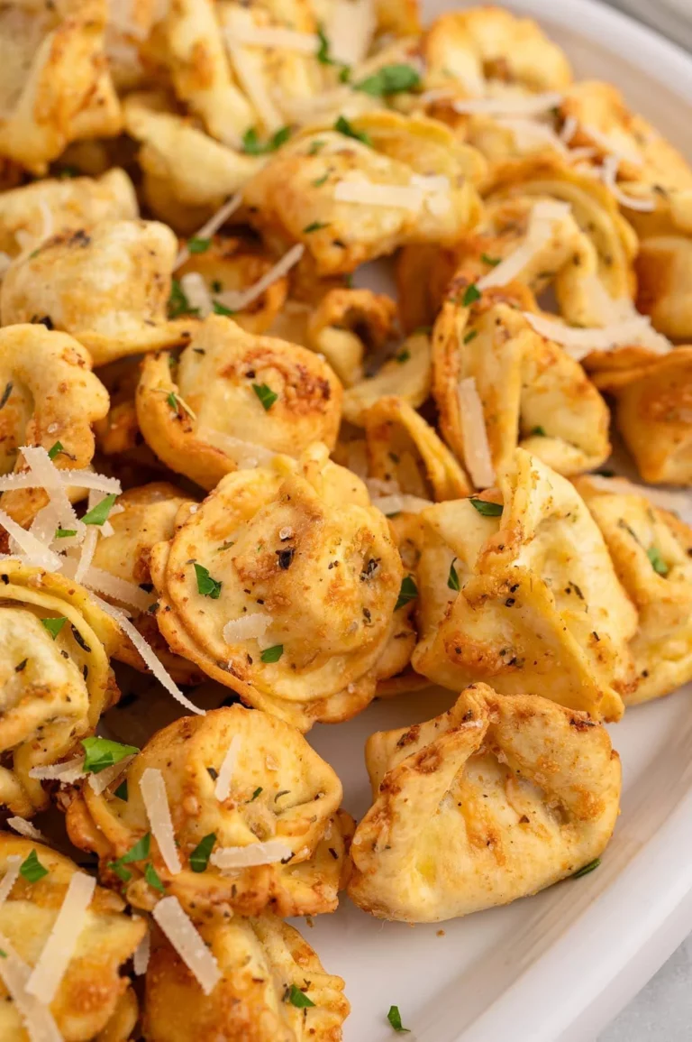 Crispy Air Fryer Tortellini served in a bowl with dipping sauce