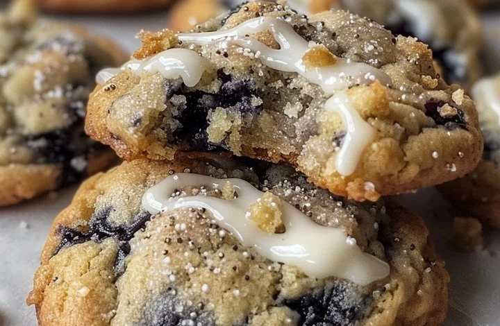 Blueberry muffin cookies topped with delicious streusel on a white plate