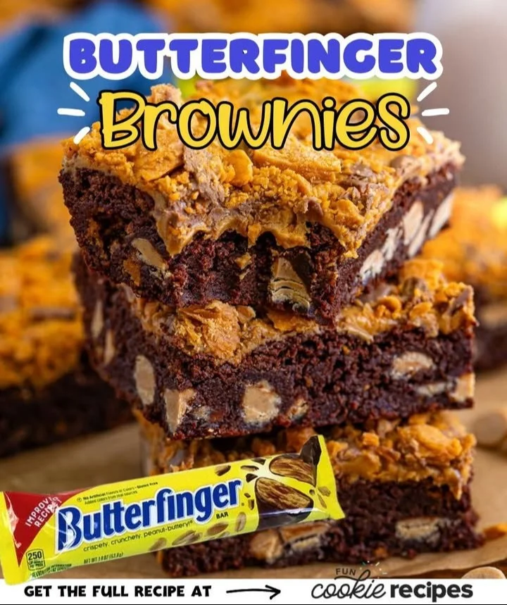 Delicious Butterfinger Brownies topped with crushed Butterfinger candy.