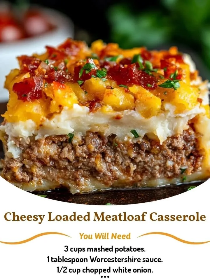 Cheesy loaded meatloaf casserole topped with melted cheese and herbs