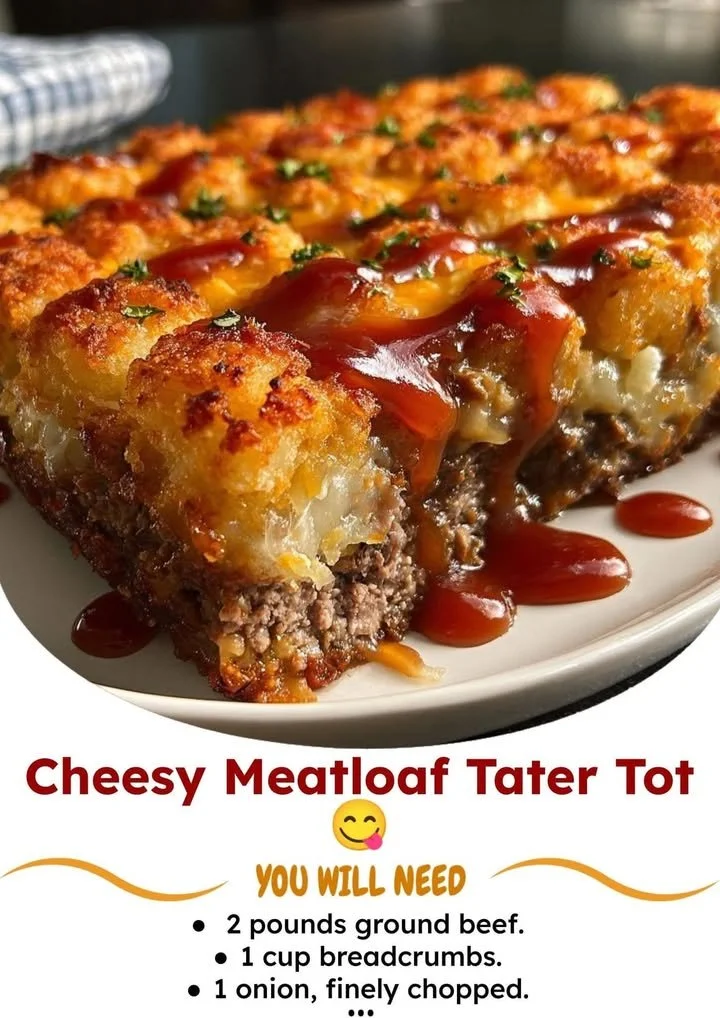 Cheesy meatloaf tater tot dish topped with melted cheese and crispy tater tots