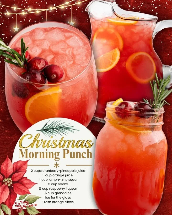 Festive Christmas Punch in a clear glass with cranberries and oranges