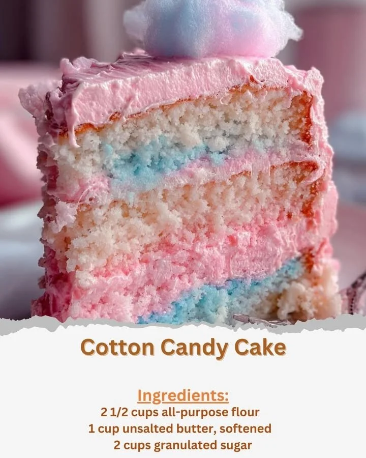 A colorful Cotton Candy Cake topped with fluffy pastel cotton candy