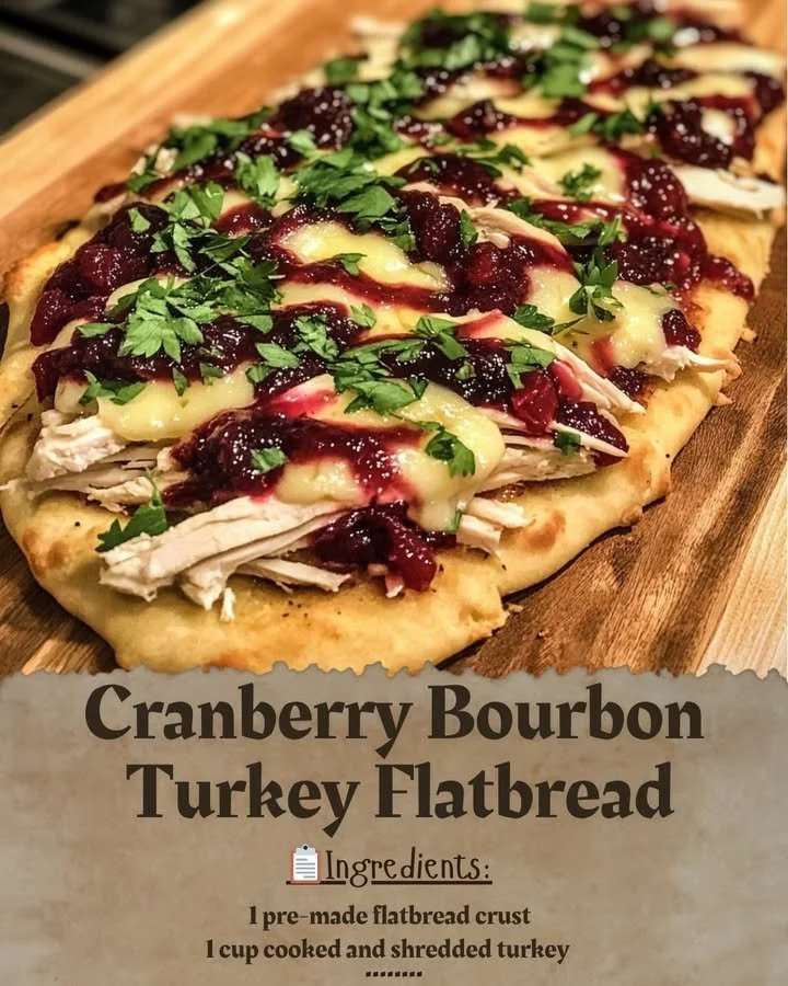 Cranberry Bourbon Turkey Flatbread topped with fresh herbs and cranberries