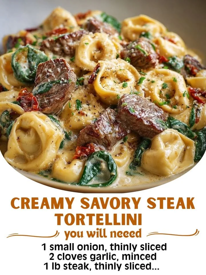Creamy savory steak tortellini dish garnished with herbs