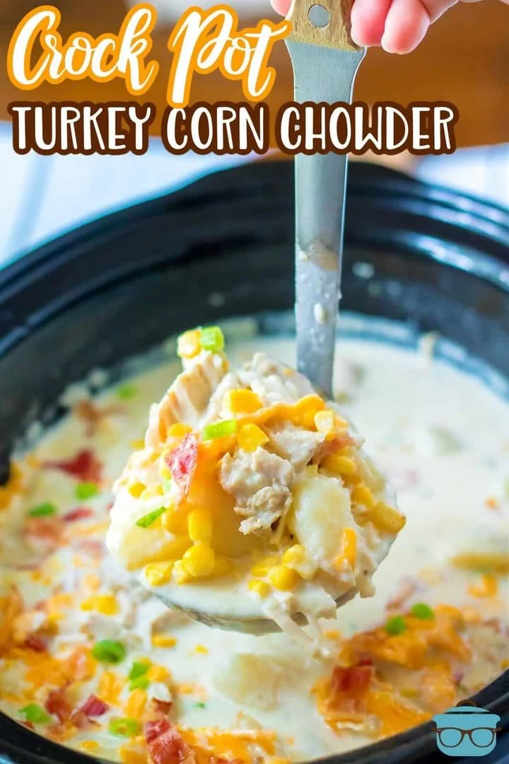 A bowl of creamy Crock Pot Turkey Chowder with vegetables and herbs.