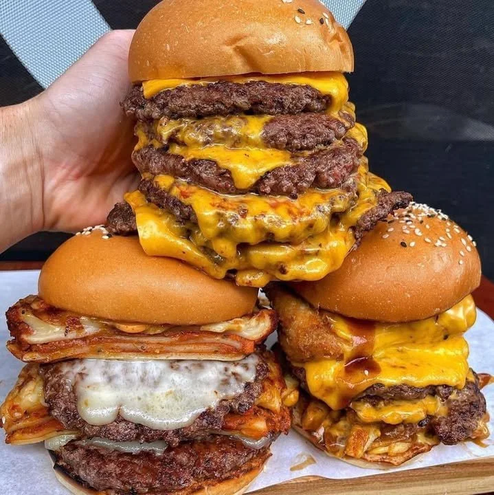 Delicious Fat Pants Season Burger with toppings and sides