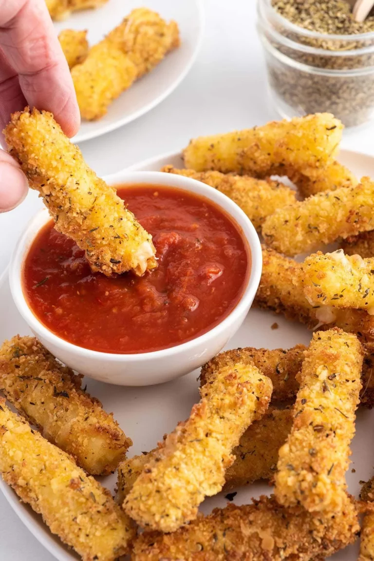 Golden homemade cheese sticks ready to be served as a delicious snack