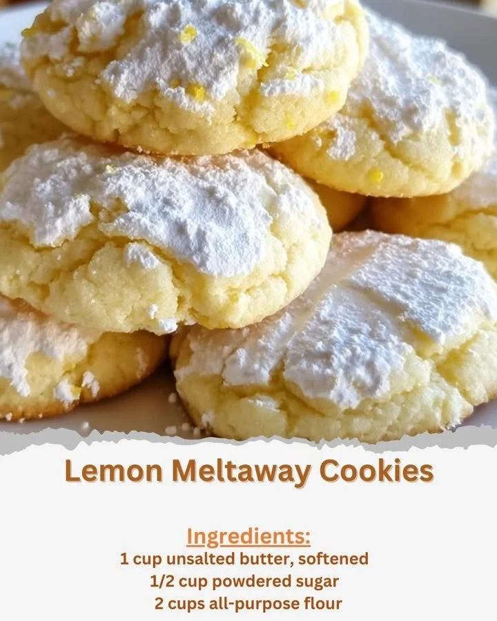 Plate of homemade Lemon Meltaway Cookies dusted with powdered sugar