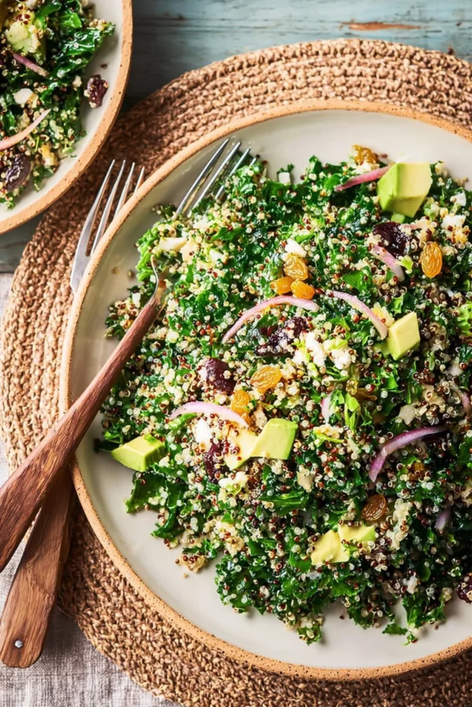 Quinoa salad with shredded greens and raisins served in a bowl