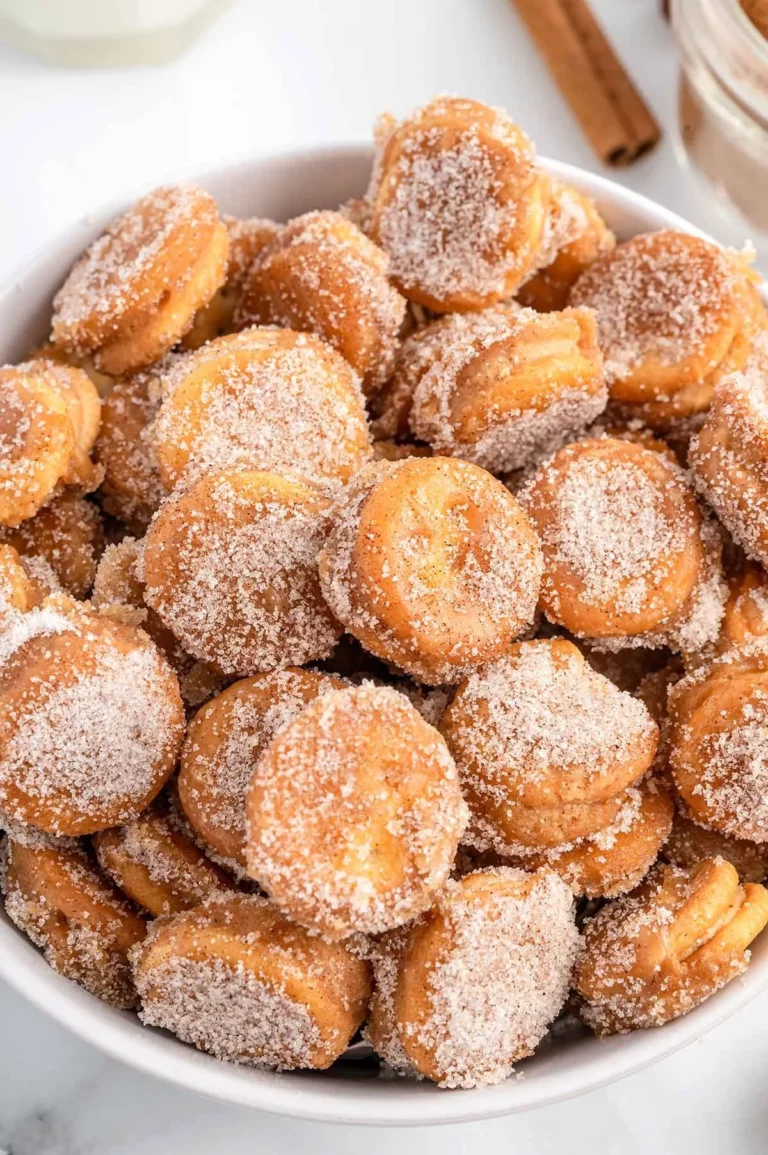 Delicious Ritz Churro Bites displayed in a bowl, coated in cinnamon sugar.