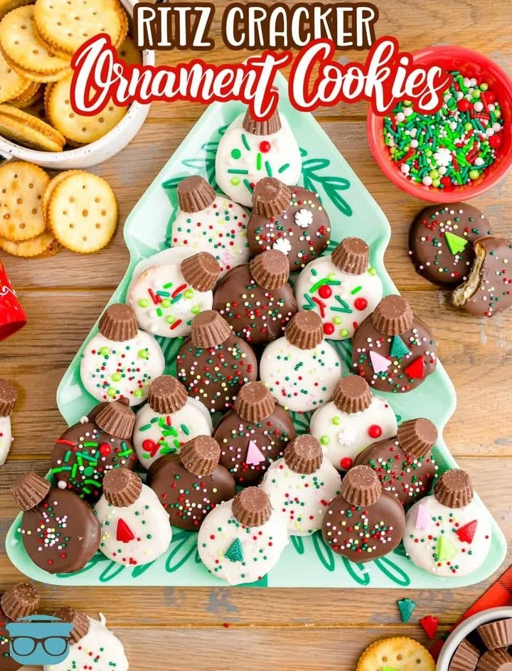 Ritz Cracker Christmas Ornament Cookies decorated with icing and festive sprinkles