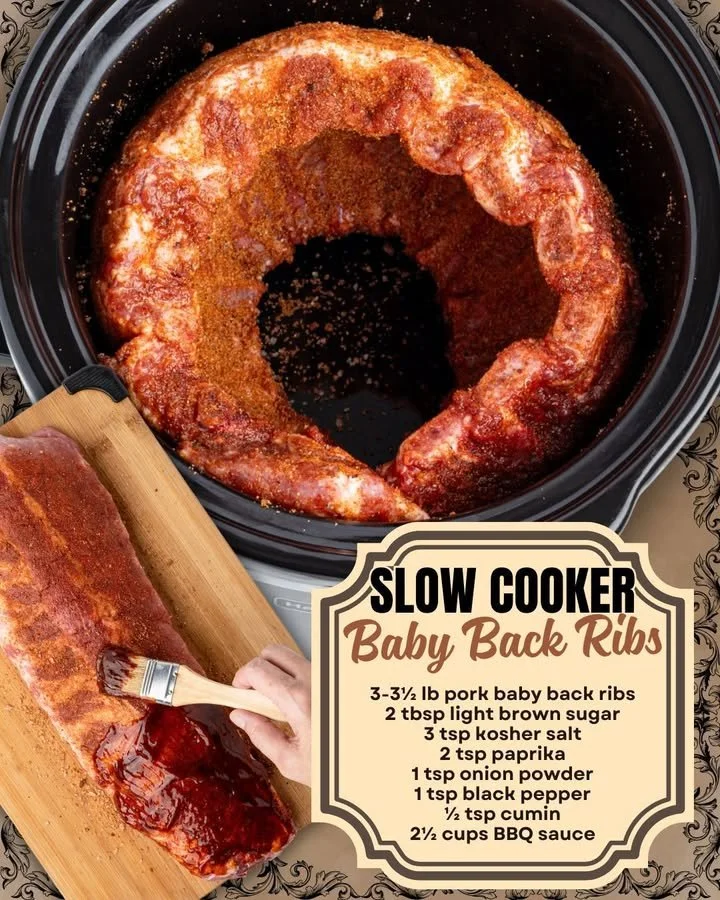 Delicious slow cooker baby back ribs served with barbecue sauce