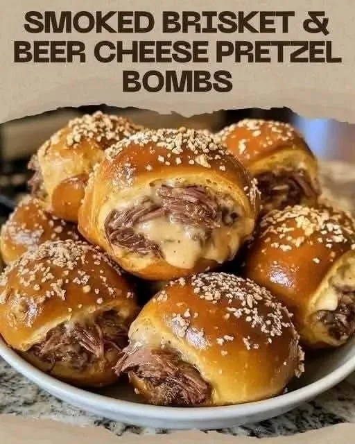 Smoked brisket and beer cheese pretzel bombs served on a rustic wooden platter