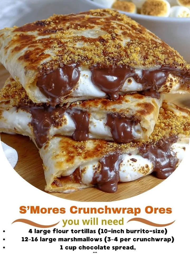 A delicious S'Mores Crunchwrap featuring chocolate, marshmallows, and graham crackers.