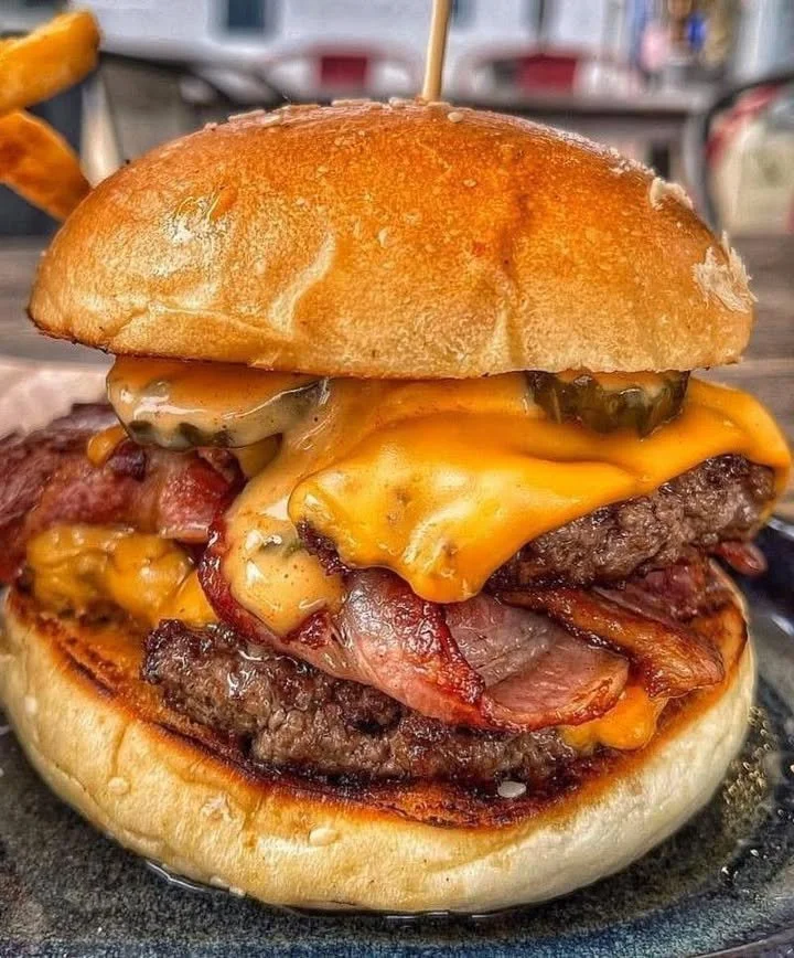 A trendy outfit with a drip style that encourages others to SHARE and elevate their fashion.