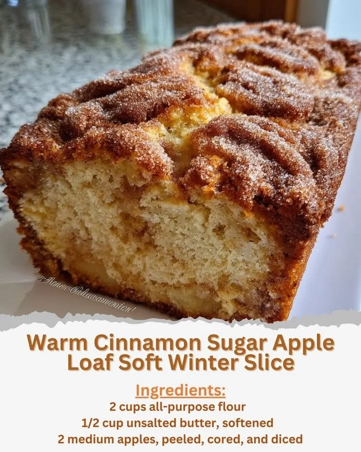 Warm cinnamon sugar apple loaf fresh out of the oven with a dusting of cinnamon sugar.