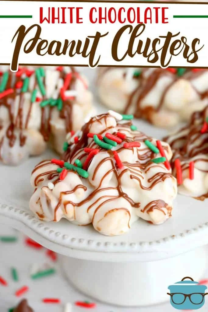 Homemade white chocolate peanut clusters on a marble surface