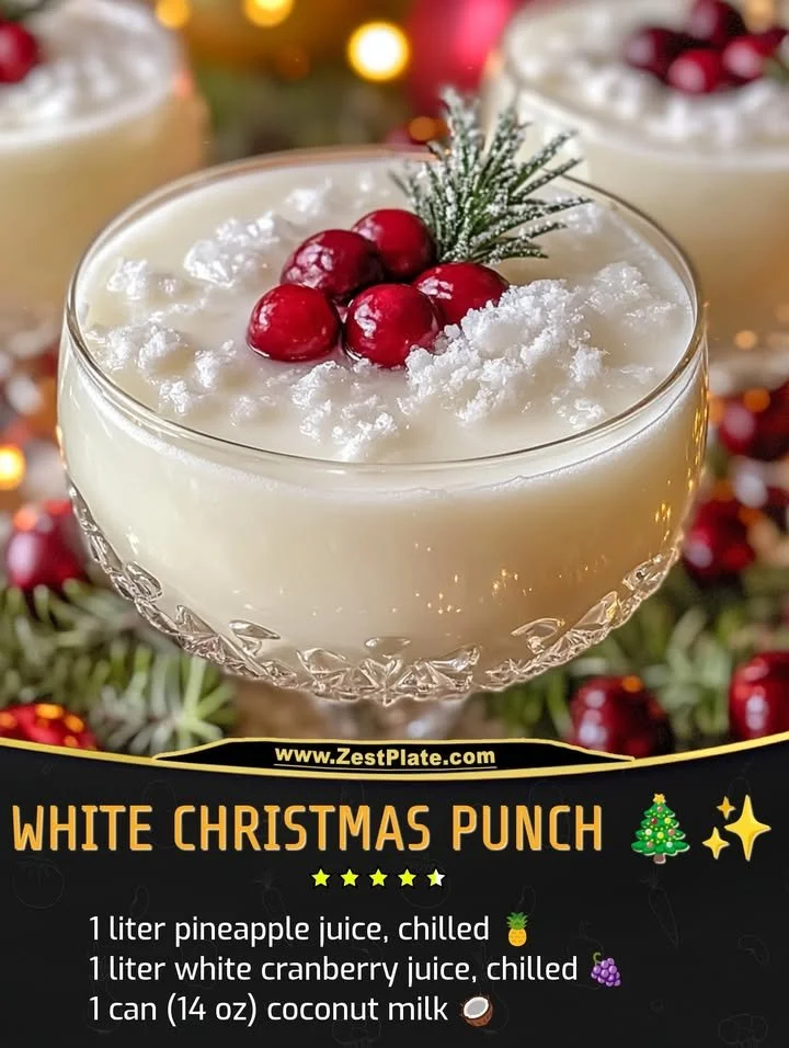 Refreshing White Christmas Punch served in a festive glass with holiday decorations